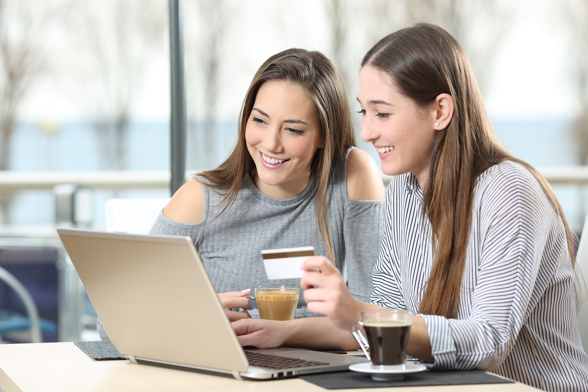 Two women buying online
