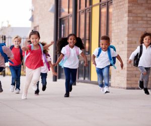children happily going home on school break