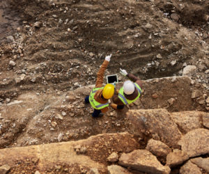 Two workers in quarry pit